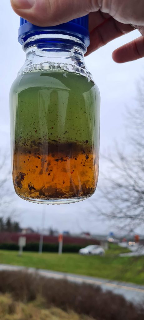 Dieselprøve med slam i bunnen